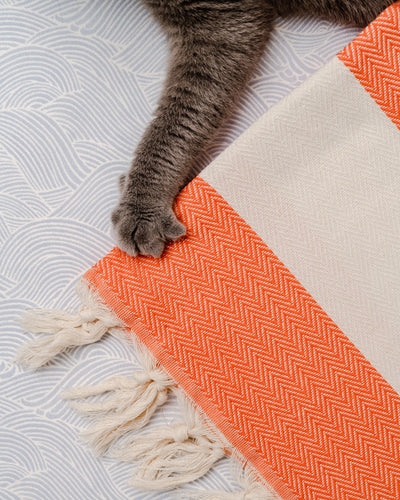 orange fishbone hammam towel made of recycled cotton